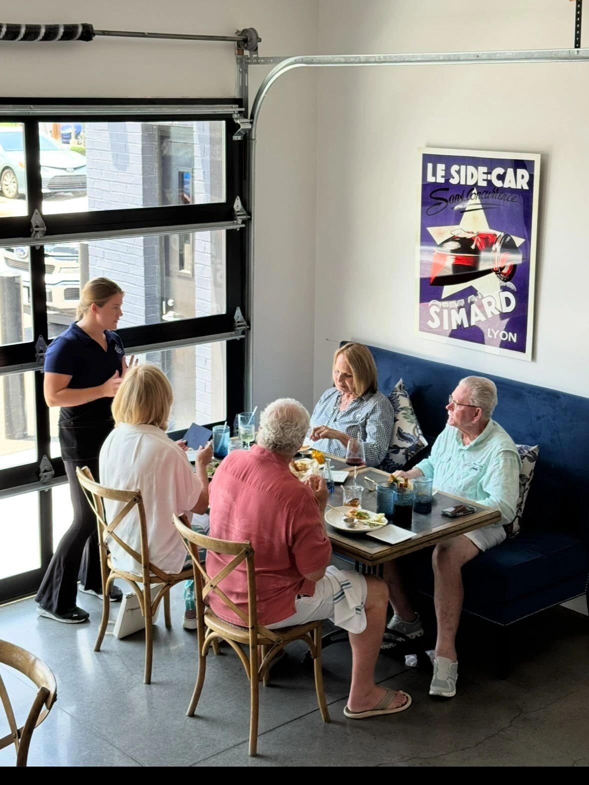 Group dining at restaurant booth